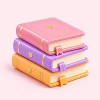 Stack of Creator Academy course books