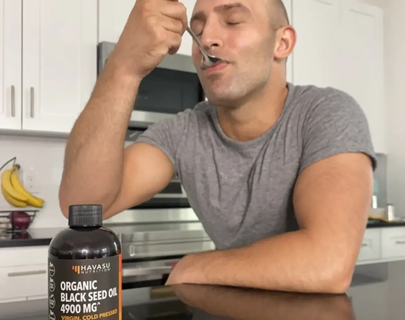 Creator holding two products from different portfolio brands