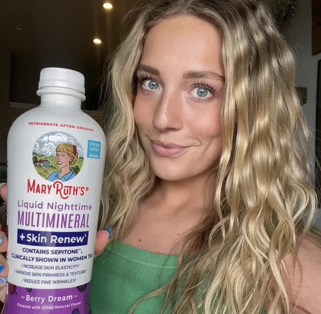Creator presenting a MaryRuth Organics multimineral bottle