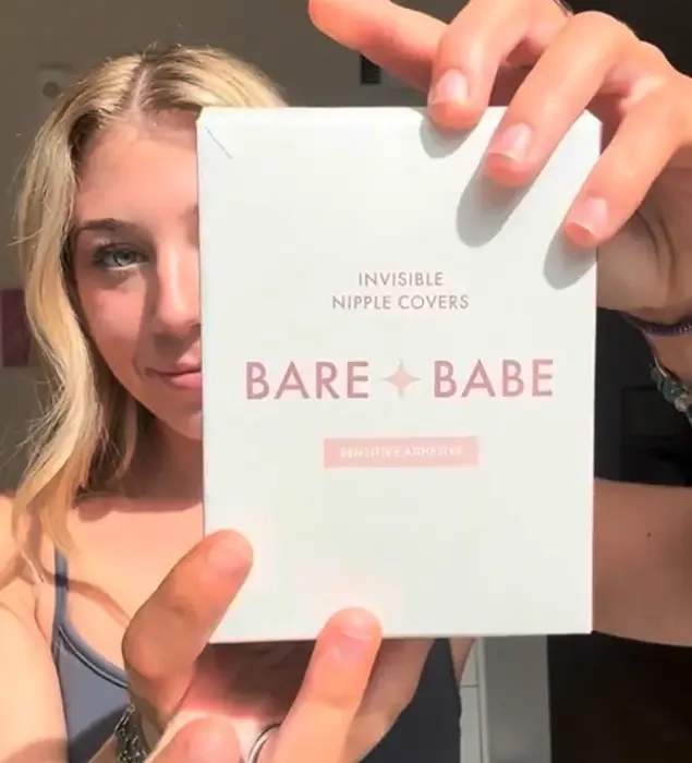 Creator holding a Bare Babe product box