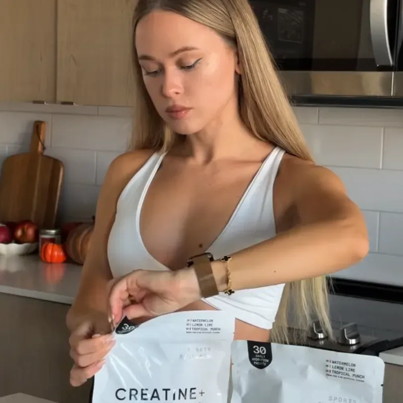 Creator filming a Creatine + Electrolytes pouch at home for social