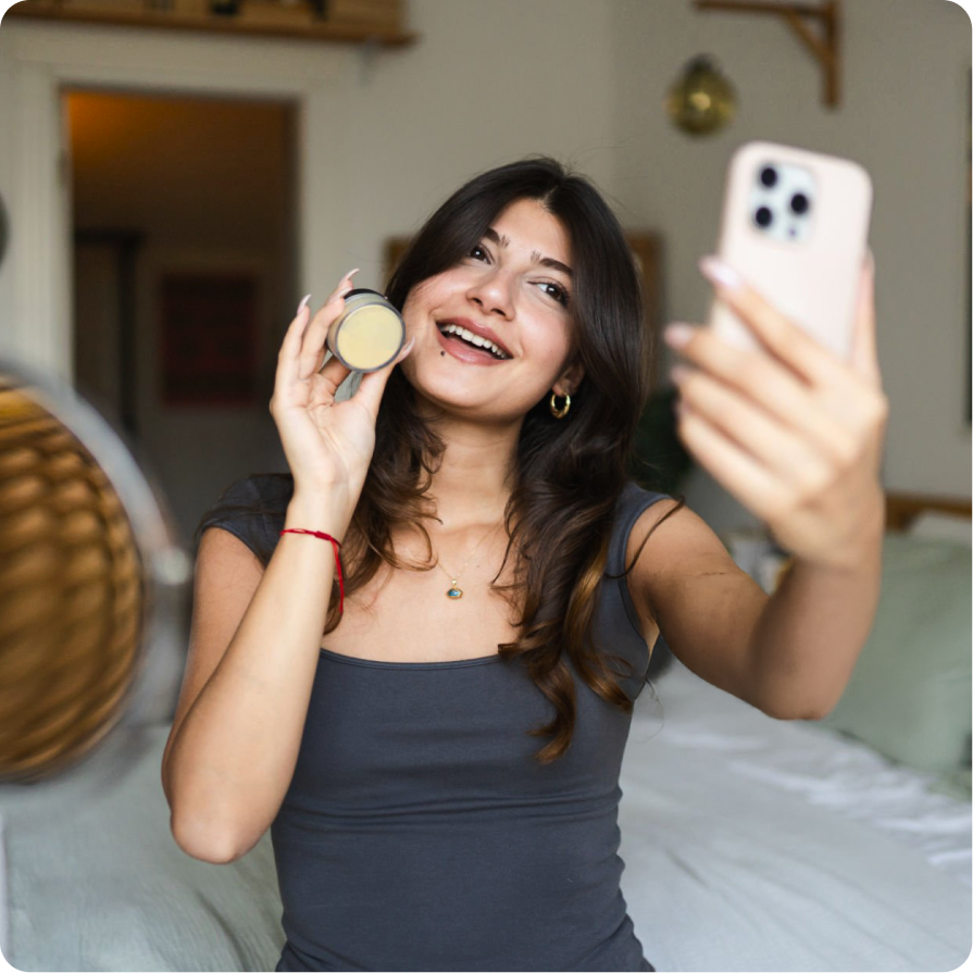 Insfluencer taking a selfie with a product